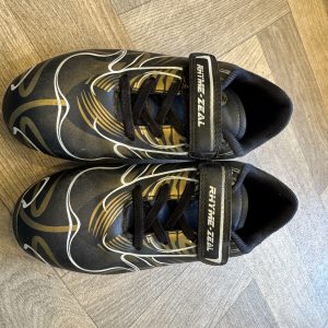 Rhyme-Zeal Football Boots